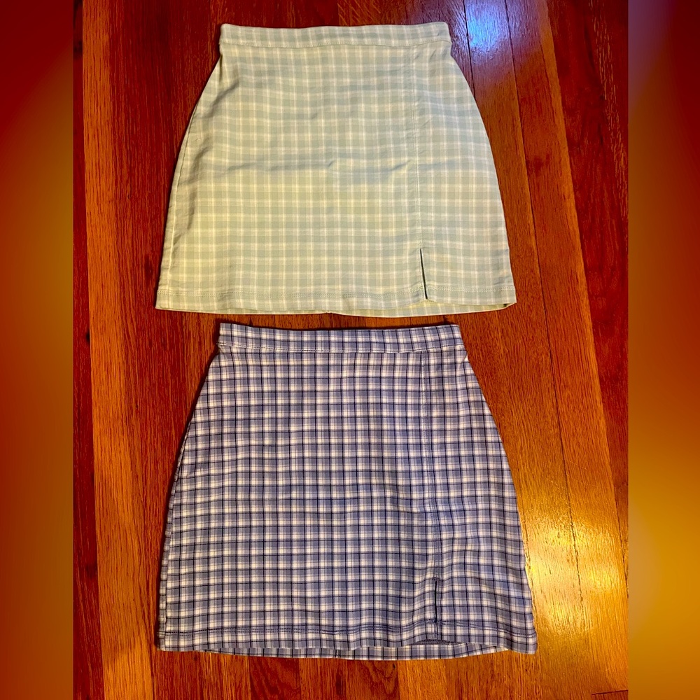 Two Hollister plaid miniskirts, back zip.